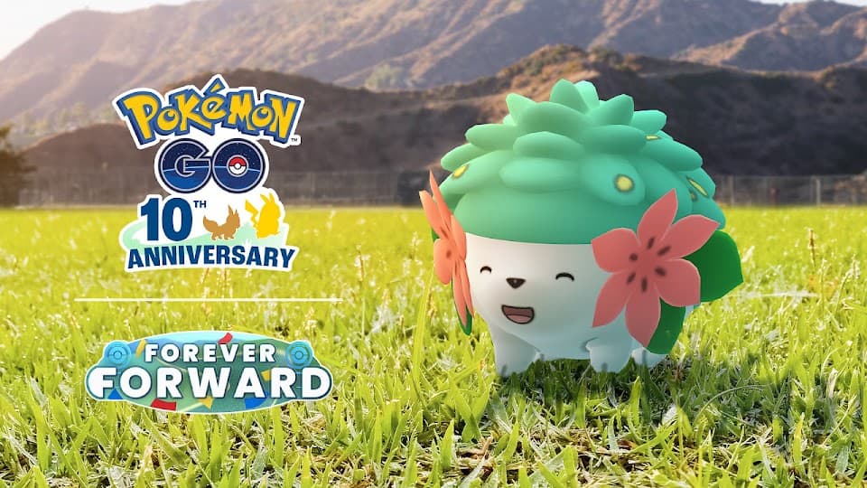 Shiny Shaymin in a field of grass next to the Pokemon Go 10th anniversary logo